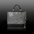 VG black handbag & salt and pepper glitter